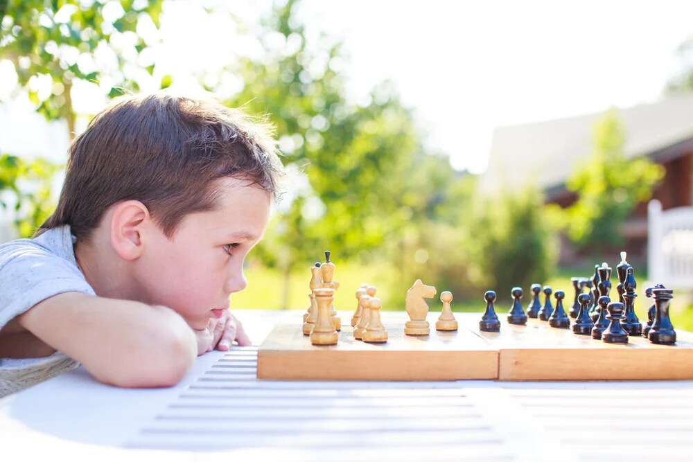 Chess teaches kids how to manage their emotions. During a game, they may feel excitement, frustration, or disappointment. However, they quickly learn that staying calm and composed is key to making smart decisions.