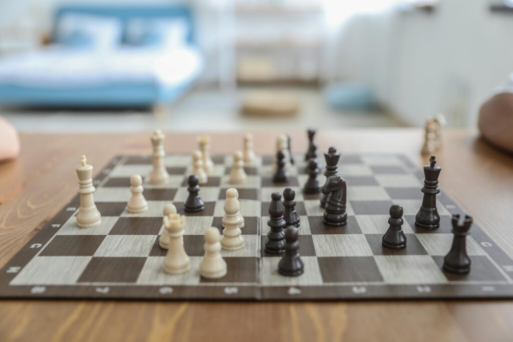 The Royal Chess Coaching Academy offers both online and in-person training for players of all ages and skill levels. With over 20 years of experience, their tutors include Chess Champions, Grandmasters, and International or FIDE Masters. They emphasize not only chess proficiency but also the development of mental and emotional intelligence.