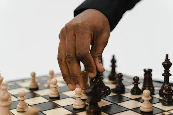 In Hamad Town, some clubs and coaches offer chess lessons where students sit in a room together and learn from a coach on a whiteboard or a demonstration board. These sessions usually happen once or twice a week, depending on how the group is formed.
